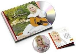 Dolly Parton - Pure &amp; Simple  (cracker barrell uitgave met 48 p. boekje, 2 bonus songs &amp; dolly magneetje)